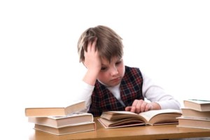 young studiing boy isolated on white backgroung