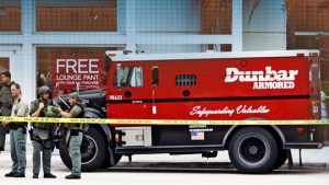 Rescue spokesman Lt. Eddy Ballester says one person was transported to the hospital by helicopter with reported gunshot wounds. (AP Photo/Alan Diaz)