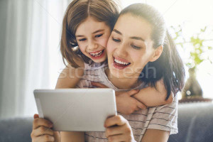 9190561_stock-photo-mom-and-child-with-tablet